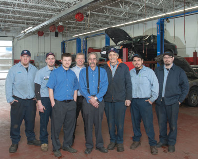 the team at mark’s auto (l to r): shane page, chase aase, tad butitta, mark butitta, terry smith, jeff johnson, juan sena and keith fish. 