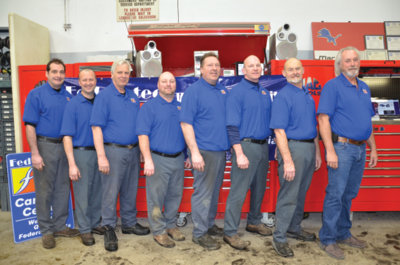brighton auto team (l to r): technician tom summers; porter les jankowski; technician chris donovan; technician mark boon; technician alan abdella; technician/owner eric muir; owner bill wasylyk; owner bobby lee keeney jr.