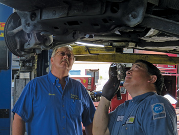 owner charlie and master  technician, glen.