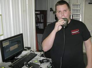 Jody Mark Buckley, manager of Buckley's Automotive in Horseheads demonstrates the use of Smart Start's breath alcohol ignition interlock device. (G. Jeffrey Aaron / Staff Photo)